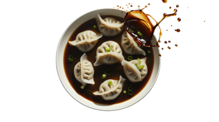 Delicious dumplings with soya Sause in bowl isolated on white background, png transparency