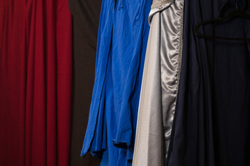 wardrobe cloth fabric materials dress red blue white black colors background space