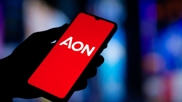 Dhaka, Bangladesh- 22 Dec 2024: Aon logo is displayed on smartphone.