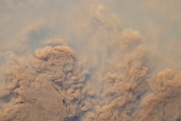 Dirty water, muddy water surface, brown abstract background, texture.