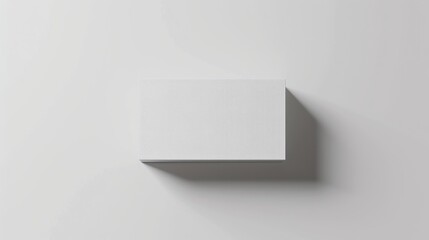 A realistic business card on white background, showcasing its layout and print quality,