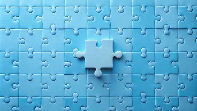 A Single Piece of a Light Blue Jigsaw Puzzle Remains Unplaced Among a Completed Grid