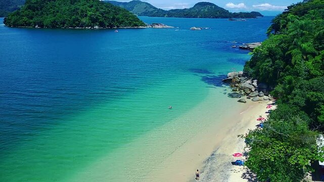 Paradise beach with crystal clear waters in Paraty, Rio de Janeiro, Brazil. Aerial view. Seascape.