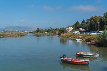Landscape with water and a dock.