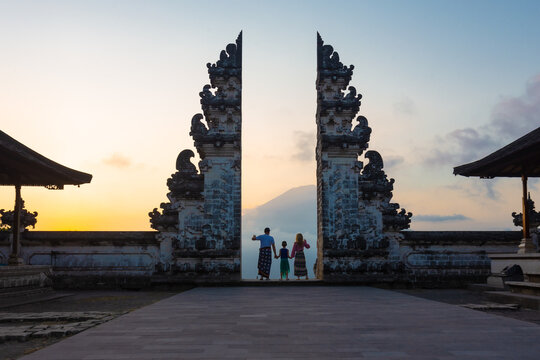  Pula Lempuyang or Lempuyang Temple located on the slopes of Mount Lempuyang, a high-altitude temple in the area, with the famous door and  Mount Agung as a backdrop, Karang Asem District, Bali