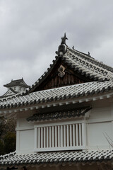 Fototapeta premium Himeji, Japan - March 06, 2024: closeup gated windows gurad house
