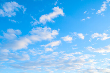 Blue sky background, fluffy clouds floating high in the sky, blue sky landscape natural scene
