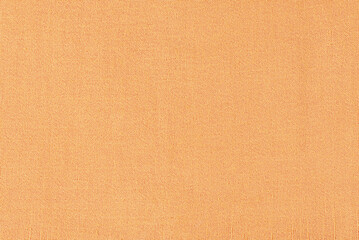 Texture of beige muslin fabric. Cotton as a background