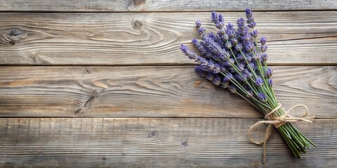 Rustic Wooden Background Featuring a Delicate Bunch of Lavender Flowers Tied with Twine