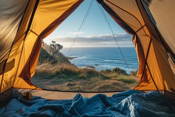 View from inside an open camping tent from the sleeping place to the beautiful seaside landscape. Concept of mountaineering, tourist recreation and sport	
