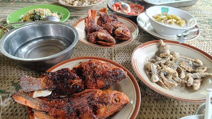 landscape photo of grilled fish with spicy seasoning
