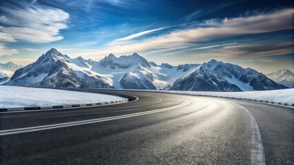 Asphalt road curves through a winter mountain landscape, offering scenic views and a sense of adventure