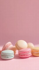 Obraz premium Delightful colorful macarons sweet treats on a pastel pink aesthetic background