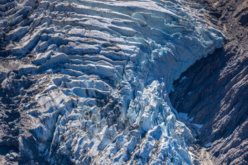Glacier le Bossons in the french Alps, Chamonix valley, Montblanc. The glacier crevasse and huge...
