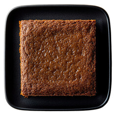 Top view of a delicious looking Parkin on a dark tray isolated on a white transparent background