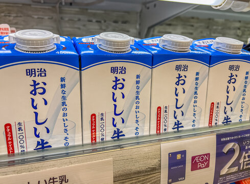 Meiji fresh milk displayed on a shelf in supermarket.  Meiji Co., Ltd formerly Meiji Dairies Corporation is a Japanese food company. 