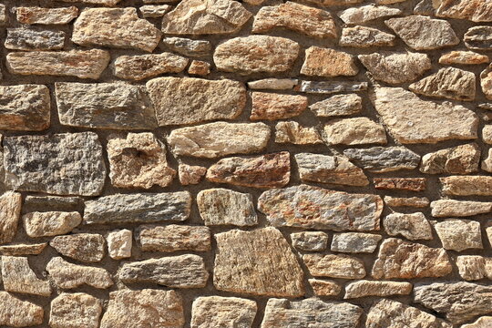 yellow beige sand color stone brick vertical wall