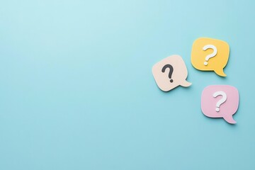 Colorful Speech Bubbles with Question Marks on Blue Background