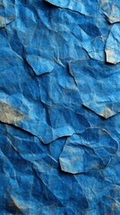 Textured blue paper background, crumpled design.
