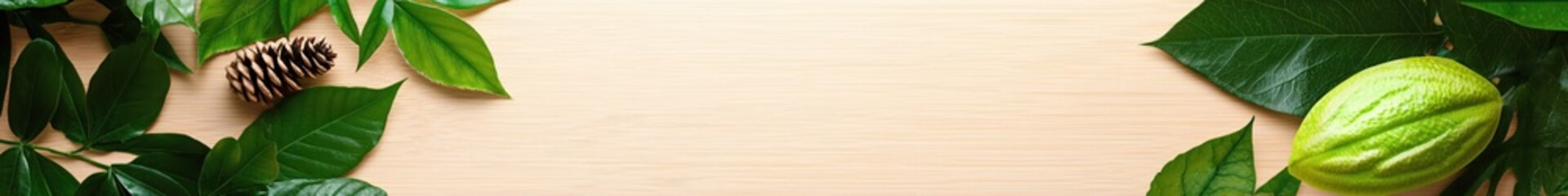 Fototapeta premium Fresh Green Leaves and Pine Cone on Wooden Surface Background