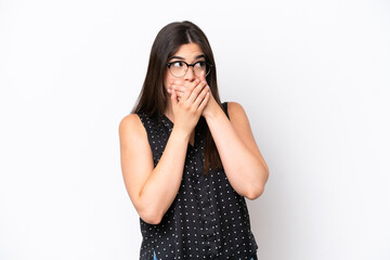 Young Brazilian woman isolated on white background covering mouth and looking to the side