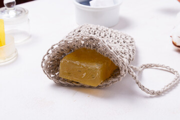 Natural home made soap bar in washcloth