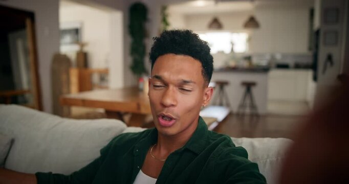 Face, home and man talk on video call for communication, pov and show off new house or furniture. Portrait, virtual chat and African person live streaming, vlogging and influencer on social media