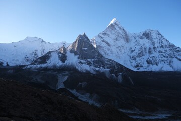 Fototapeta premium Amazing views with Ama Dablam Mount on trekking through Kongma La Pass 5535 m, from Dingboche to Lobuche. Everest Base Camp trek. Himalayas, Nepal.