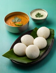 Generated image mini idli or idlies with sambar and coconut chutney- South Indian breakfast