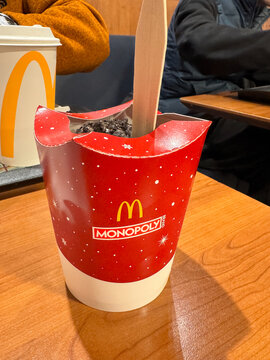 Munich, Germany - December 3, 2024: A McDonalds McFlurry with the Monopoly game branded on the packaging