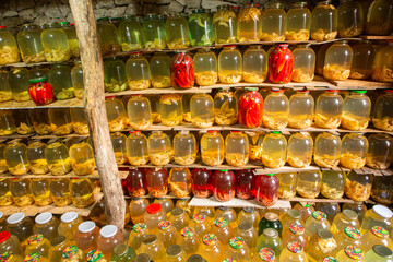 traditional underground warehouse from the Republic of Moldova full of jars of compote, cereals and vegetables