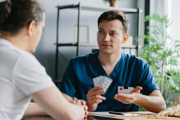 Doctor offering three different blister packs of medication to a patient, close-up shot.