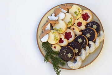 Various kinds of cookies arranged on a plate. Christmas baking