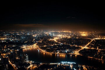 Naklejka premium City illuminated at night showing vibrant lights reflecting on water
