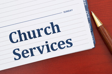 Church Services on day planner on desk