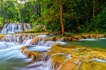 Travel and tourism in Asia. Luang Prabang, Laos. Kuang Si Waterfalls. Beautiful and largest park with cascades of waterfalls in Laos
