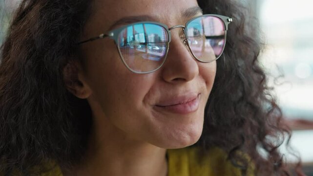 Close up face Arabian Indian Hispanic Latina woman female girl student study learning thinking solution glasses health vision sight contemplate ponder high school reflect university library education