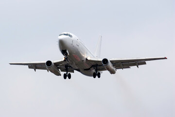 An Iconic Passenger Plane with Small Engines Approaching