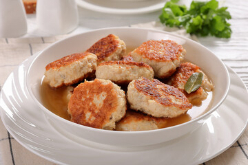 turkey potato cakes in white bowl, top view