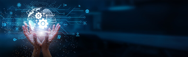 Hands holding globe with network connecting data of Automation, AI Integration, Smart Manufacturing, IoT Devices, Robotics Systems, Cloud Computing, Big Data Analytics, and Digital Transformation.