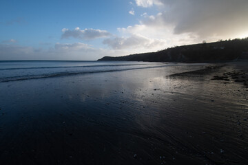 Fototapeta premium Porthpean Beach Cornwall England at sunset