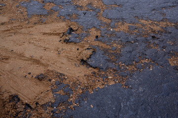Fuel oil stains on the Black Sea coastline. Environmental disaster, environmental pollution. Oil spill
