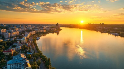 Fototapeta premium City Sunset over River: Stunning Aerial View