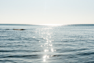 Seascape in light of sun, pond sea outside, ocean wave, nature scenery
