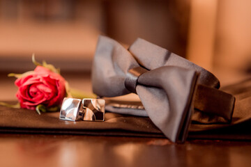 groom's cufflinks bow tie flower