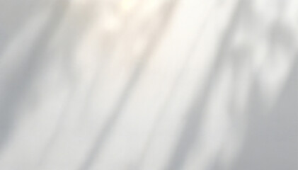 Obraz premium Soft, blurred white background with diagonal light and shadow patterns.