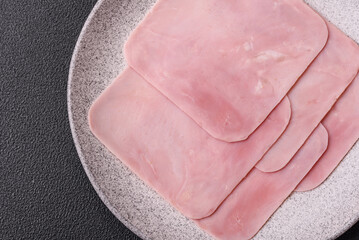 Fototapeta premium Ham cut into square slices for making delicious nutritious sandwiches