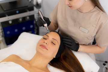 Innovative microneedling mesotherapy enhances skin rejuvenation during a relaxing beauty treatment session in a modern clinic