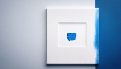 Abstract art: Blue paint stroke on white canvas against a blue background.