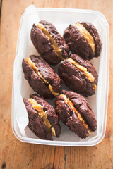Soft brownie cookies with peanut butter cream filling 